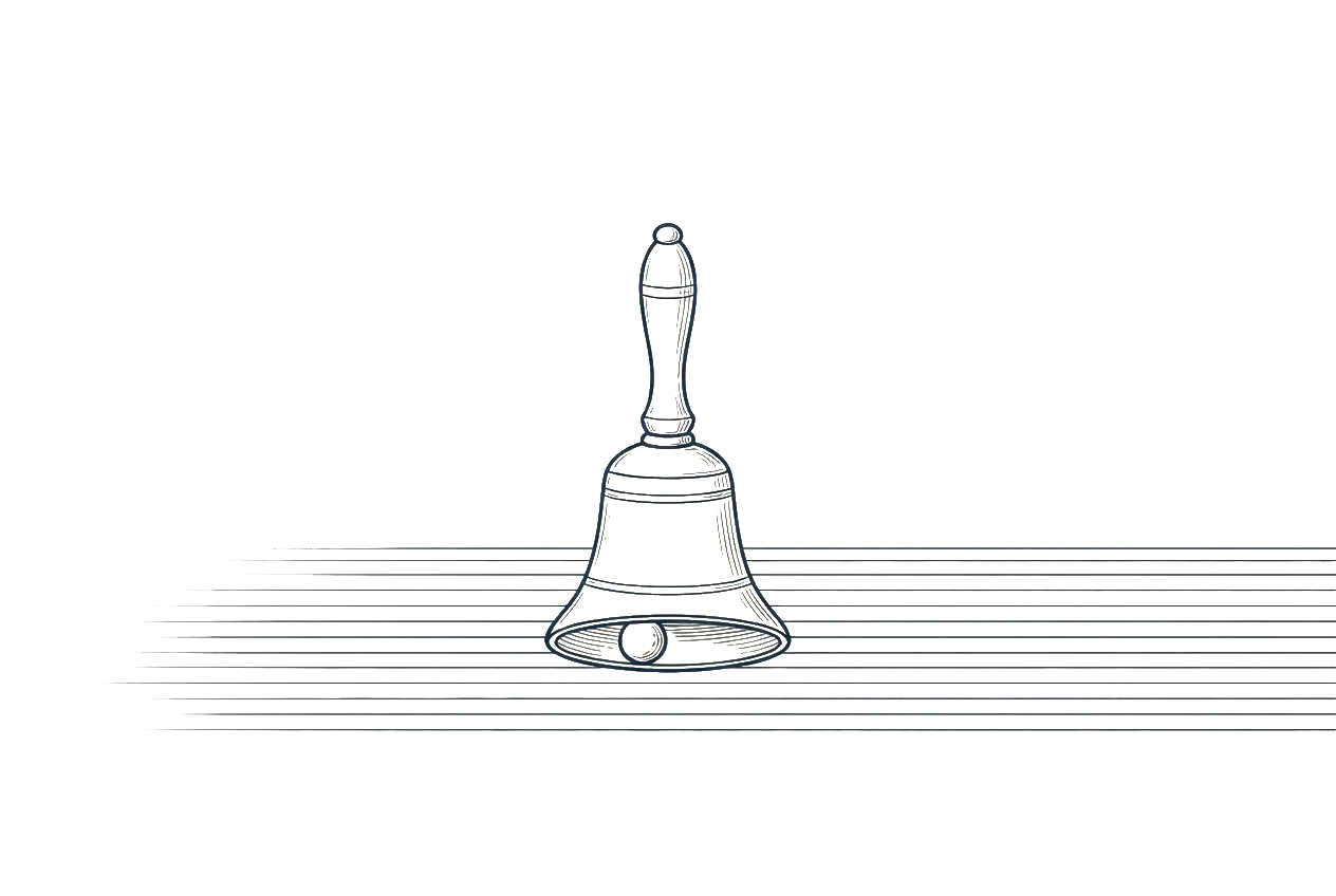 A small hand bell standing alone and upright on a ruled sheet